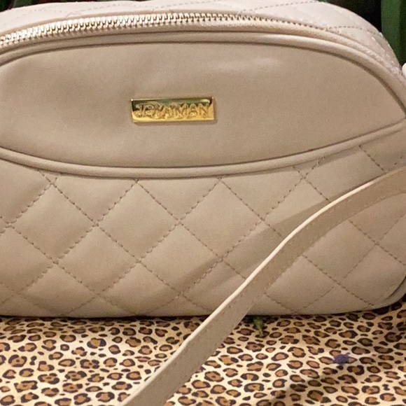 Like new Joy Imani bag trimmed in gold plated zipper attachments and shoulder. - Picture 2 of 13